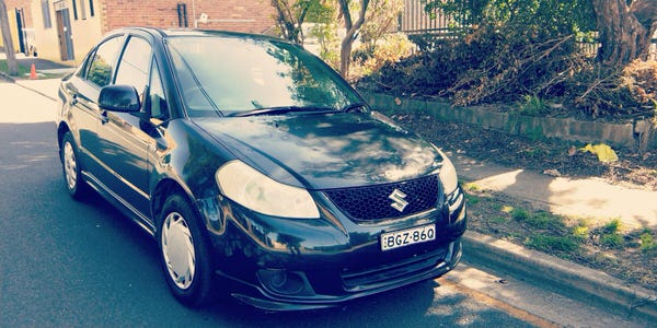 Sell my used Suzuki for Cash - front driver side view photo of the car