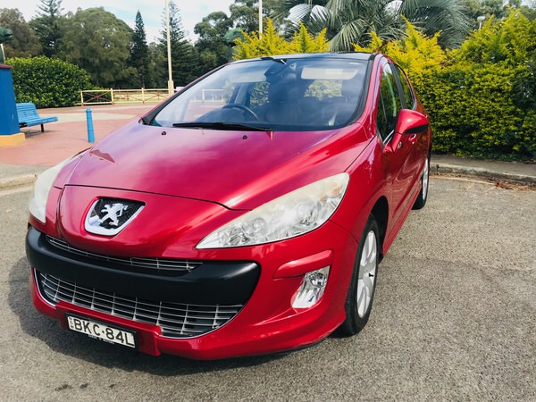 Sell my Peugeot for cash - front passengers side angle view of Peugeot 308