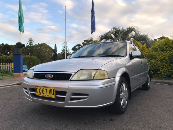 Sell my Ford Laser for Cash - Call for Instant Quote Today - front passenger side view