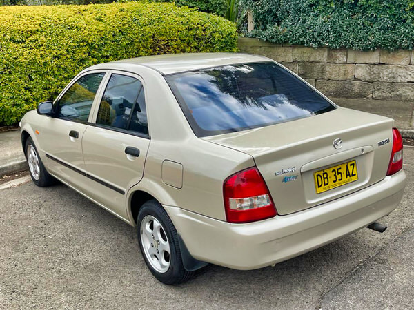 Sell my Mazda 323 for sale - photo of rear passengers side angle